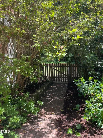 a view of a backyard of the house