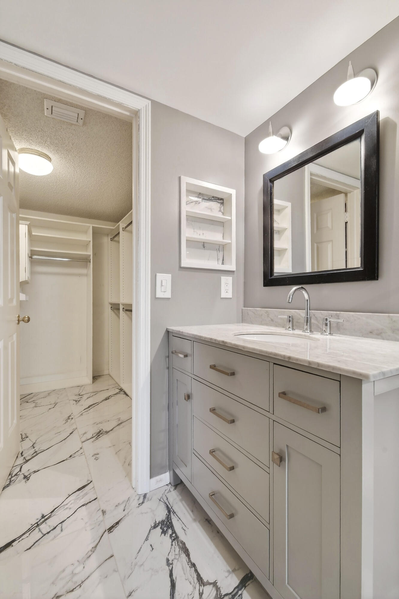 170 Seabreeze Circle Jupiter, FL 33477 - Photo 43 of 72 a bathroom with a sink double vanity and a mirror