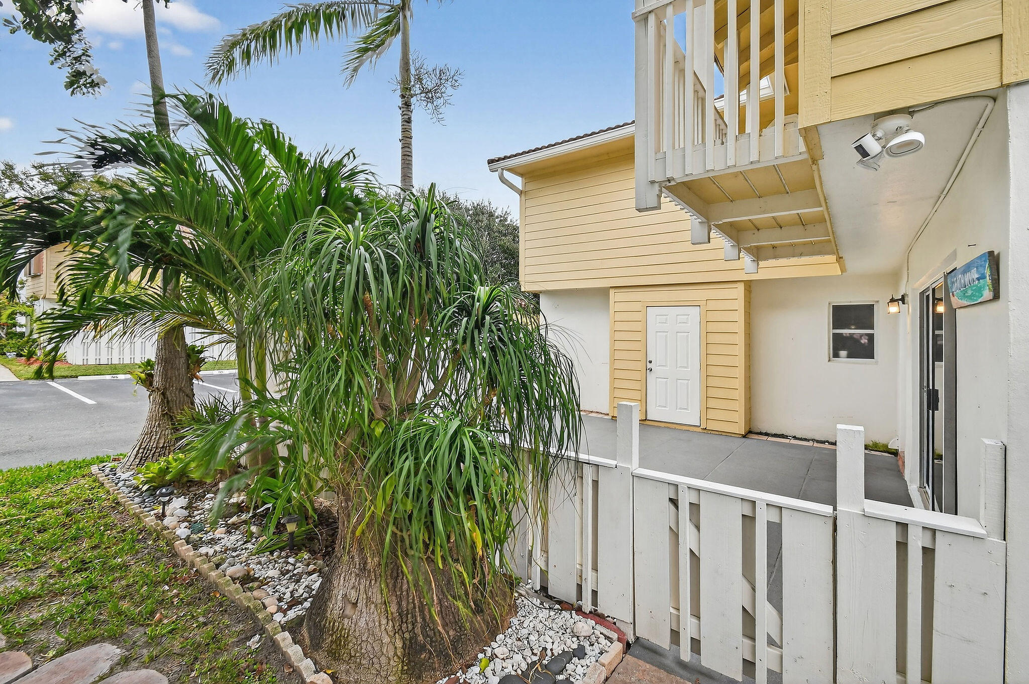 170 Seabreeze Circle Jupiter, FL 33477 - Photo 5 of 72 a view of a house with a flower plants