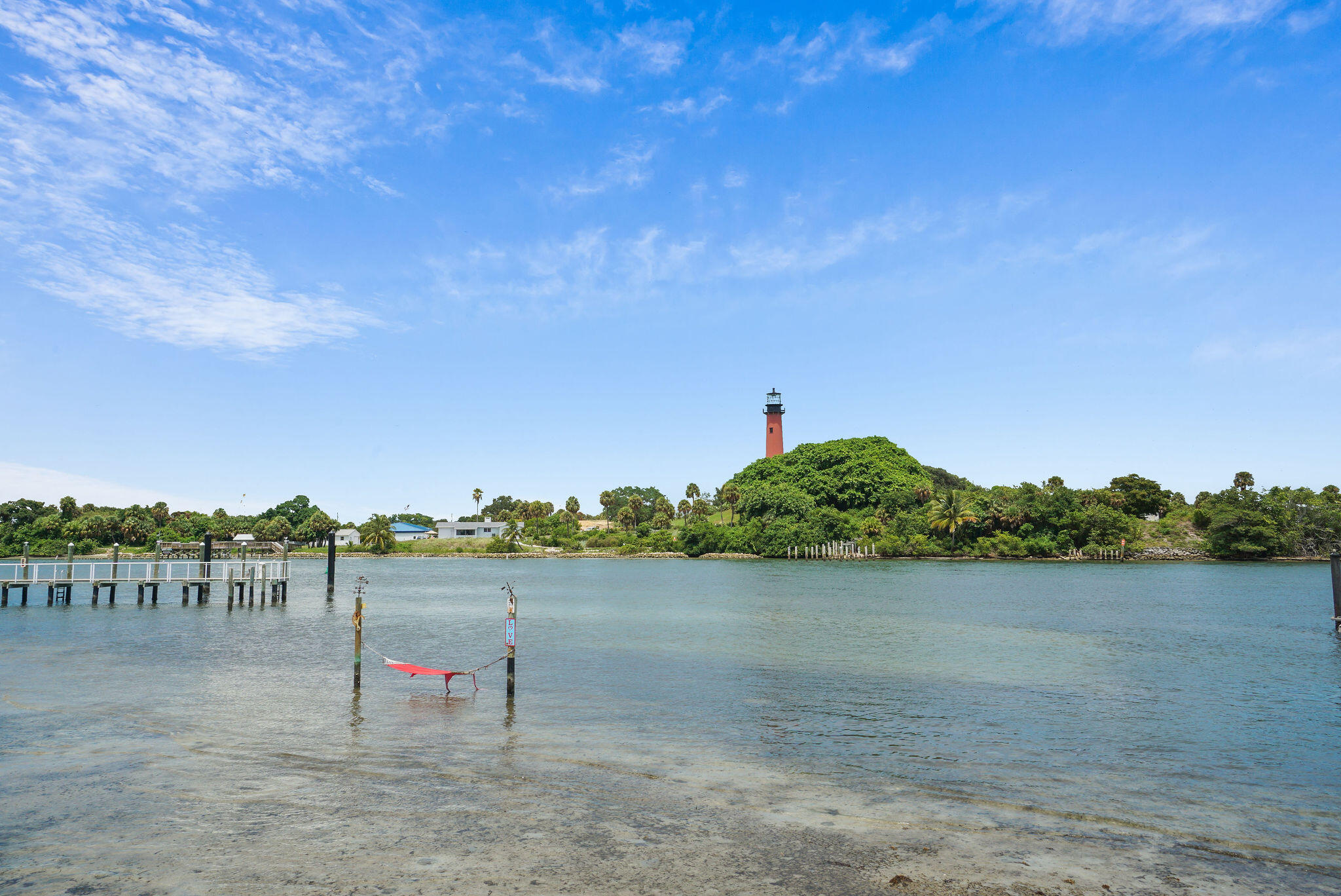 170 Seabreeze Circle Jupiter, FL 33477 - Photo 66 of 72 a view of a lake with a yard