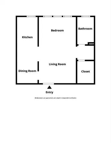 a front view of multi story residential apartment building with yard and green space