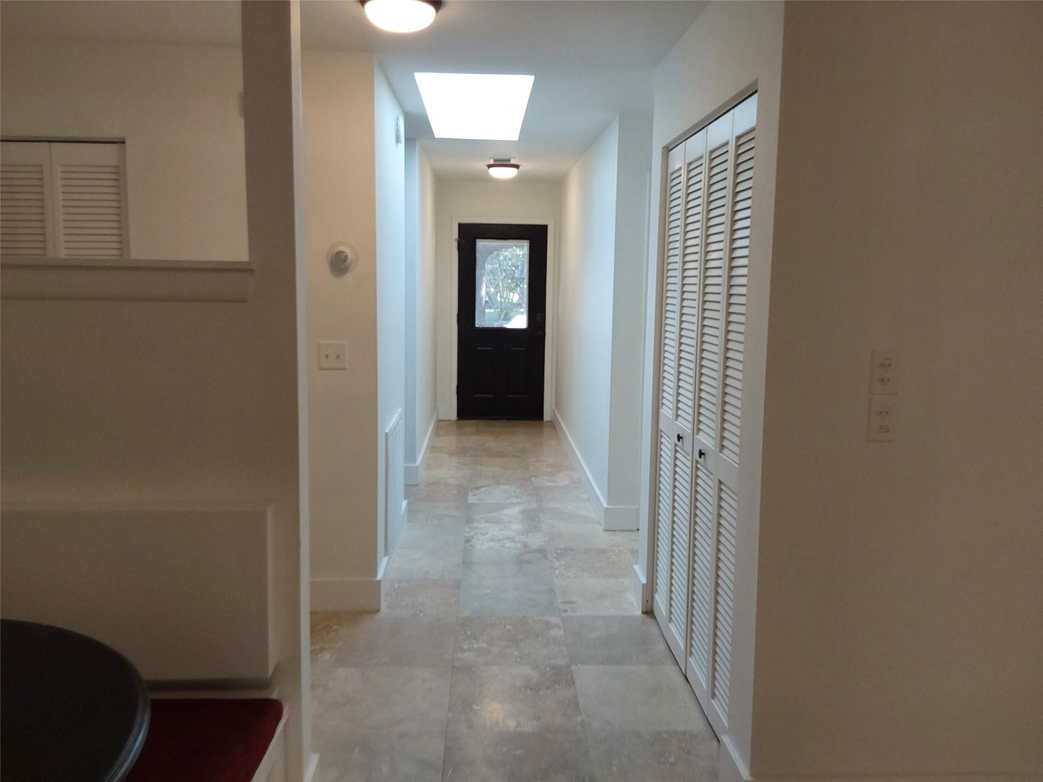722 Wentworth Street Sebastian, FL 32958 - Photo 16 of 16 a view of a hallway with wooden floor and closet