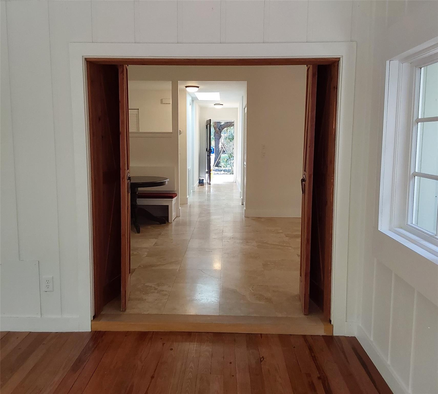 722 Wentworth Street Sebastian, FL 32958 - Photo 3 of 16 a view of a hallway with wooden floor