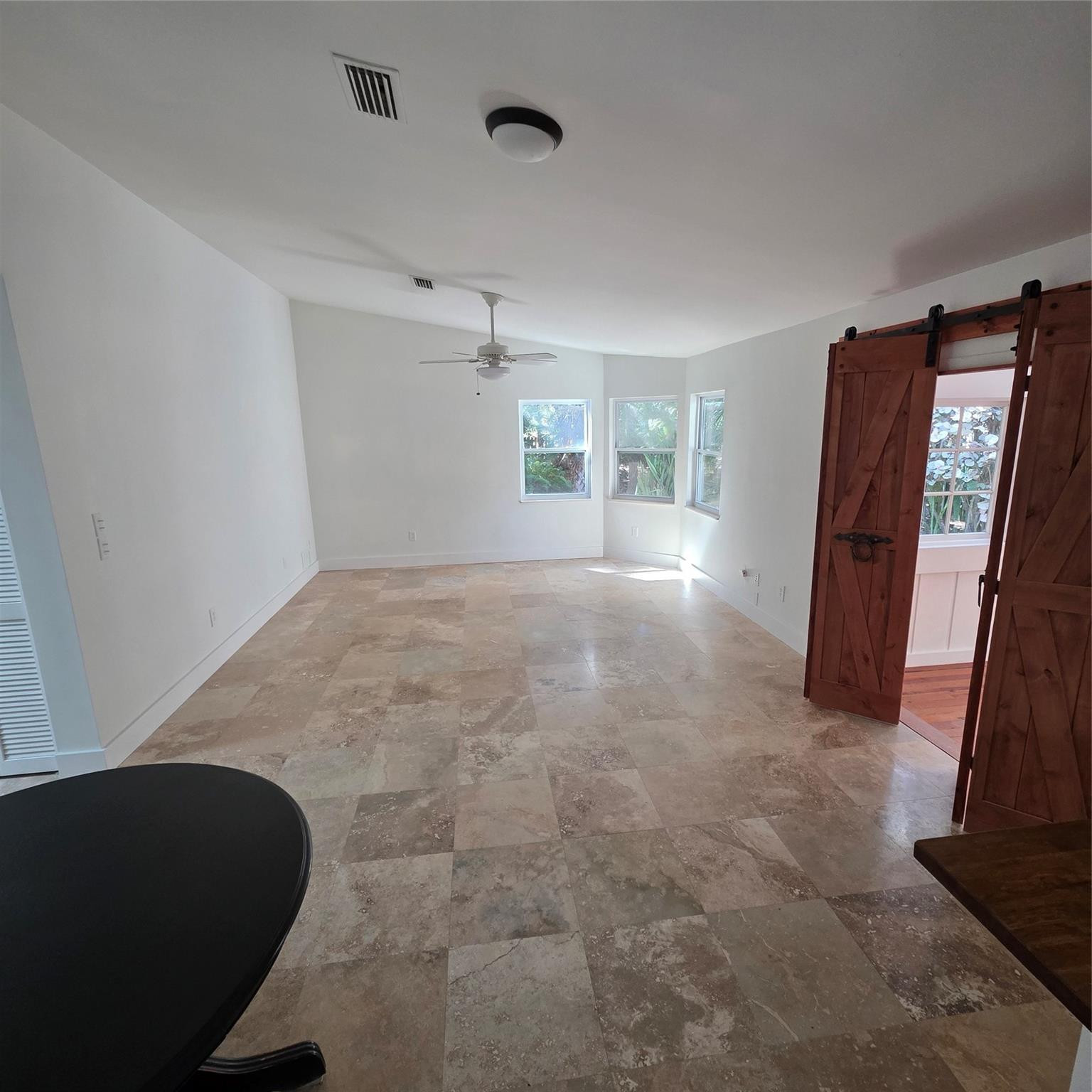 722 Wentworth Street Sebastian, FL 32958 - Photo 8 of 16 a view of empty room with front door