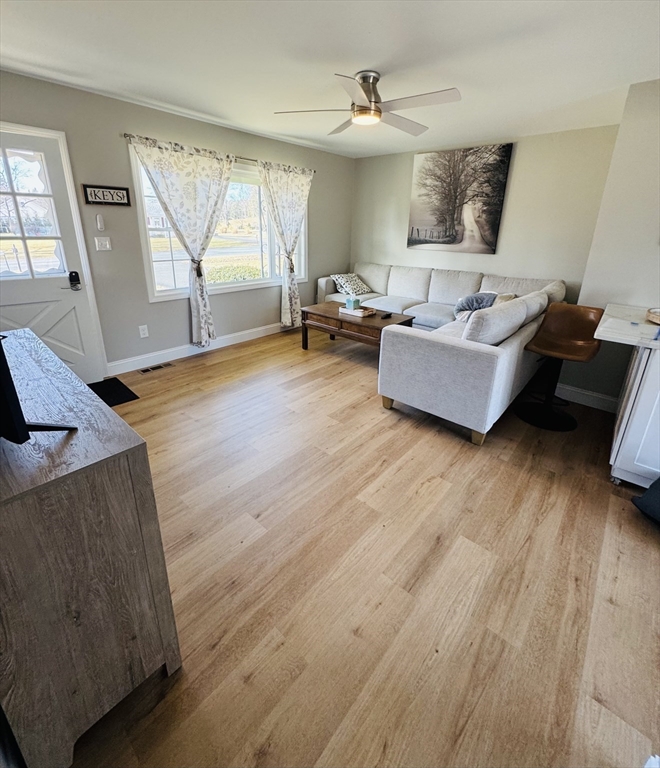 31 Deane Road Bernardston, MA 01337 - Photo 12 of 35 a living room with furniture and a wooden floor