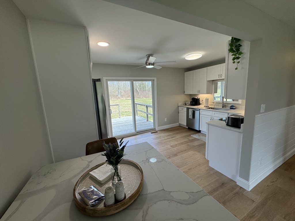 31 Deane Road Bernardston, MA 01337 - Photo 13 of 35 a kitchen with a sink a stove and a chandelier