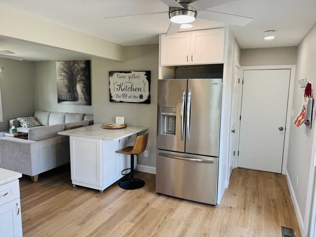 31 Deane Road Bernardston, MA 01337 - Photo 17 of 35 a room with wooden floors and white walls