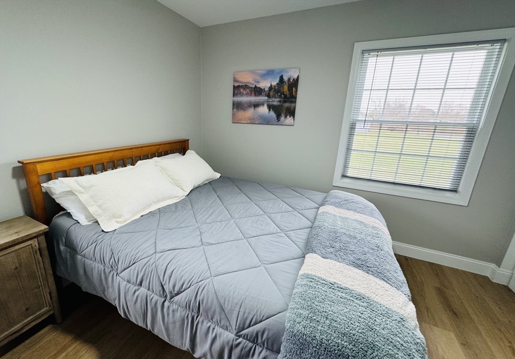 31 Deane Road Bernardston, MA 01337 - Photo 20 of 35 a bed sitting in a bedroom next to a window
