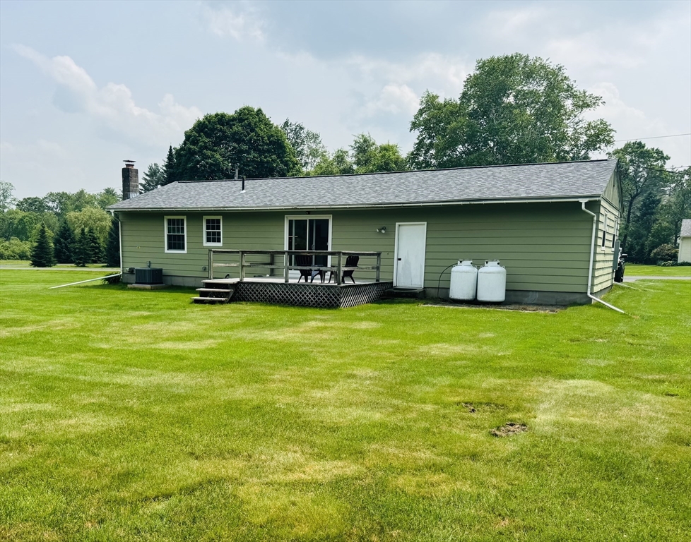 31 Deane Road Bernardston, MA 01337 - Photo 3 of 35 a front view of house with yard and outdoor seating