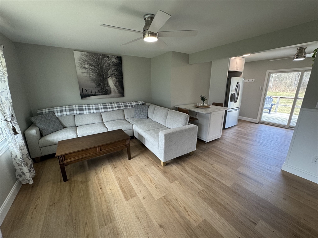 31 Deane Road Bernardston, MA 01337 - Photo 8 of 35 a living room with furniture and a wooden floor