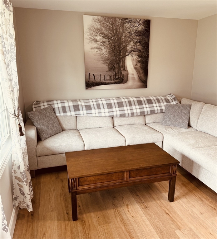 31 Deane Road Bernardston, MA 01337 - Photo 10 of 35 a living room with furniture and a wooden floor
