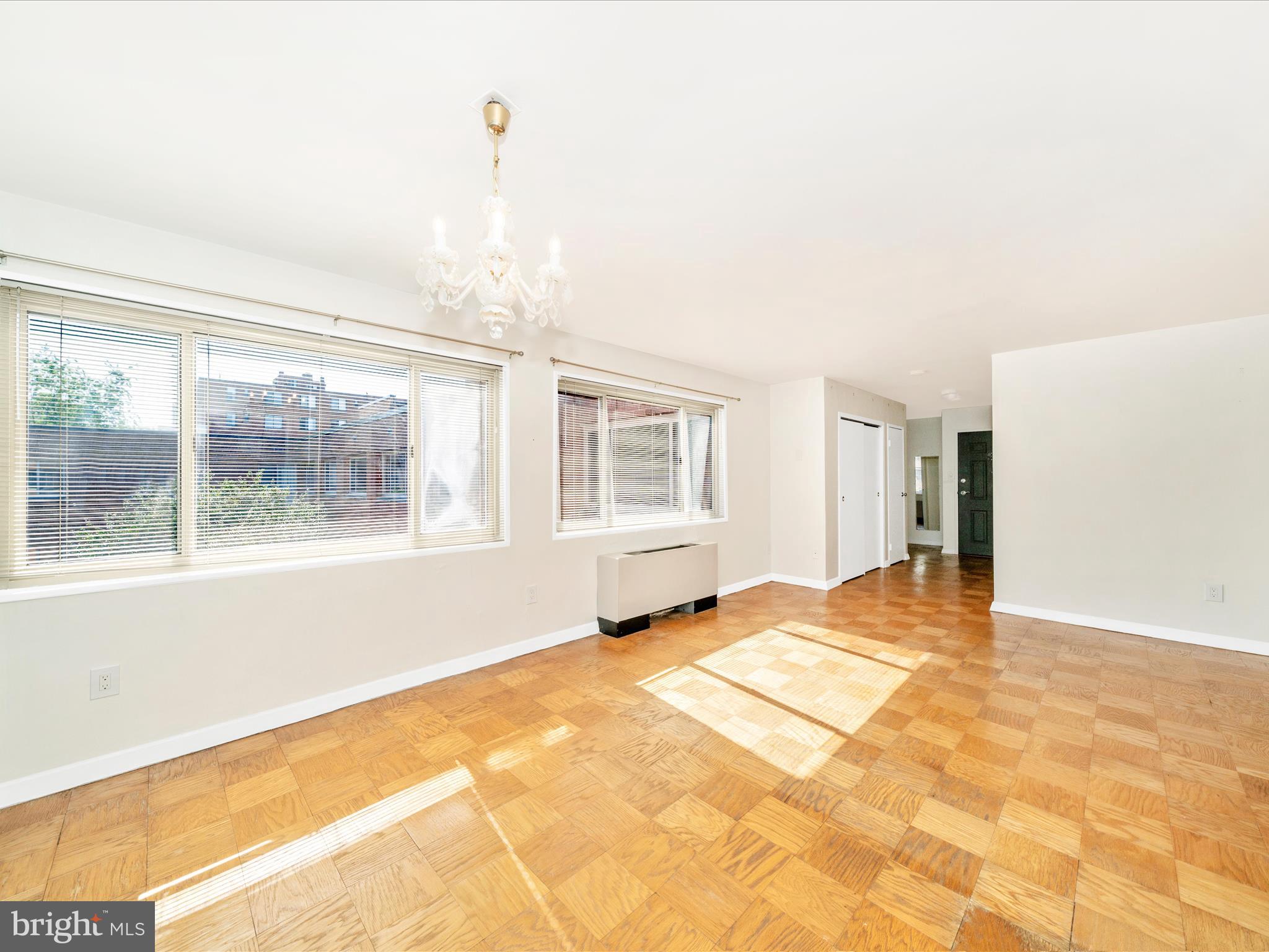 3900 Tunlaw Road Northwest, Unit 613 Washington, DC 20007 - Photo 15 of 31 a view of an empty room with a window