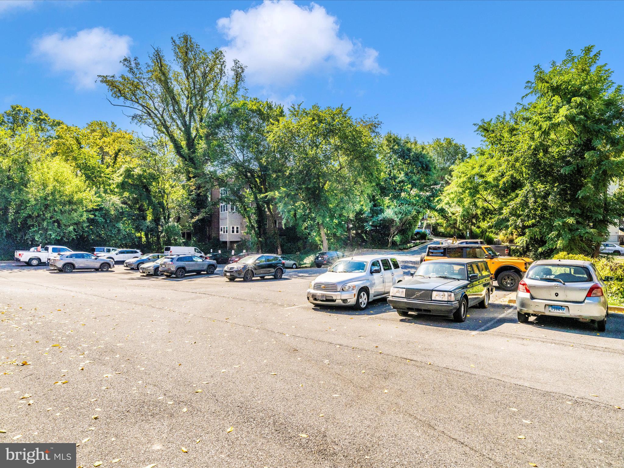 3900 Tunlaw Road Northwest, Unit 613 Washington, DC 20007 - Photo 29 of 31 a view of street with parked cars