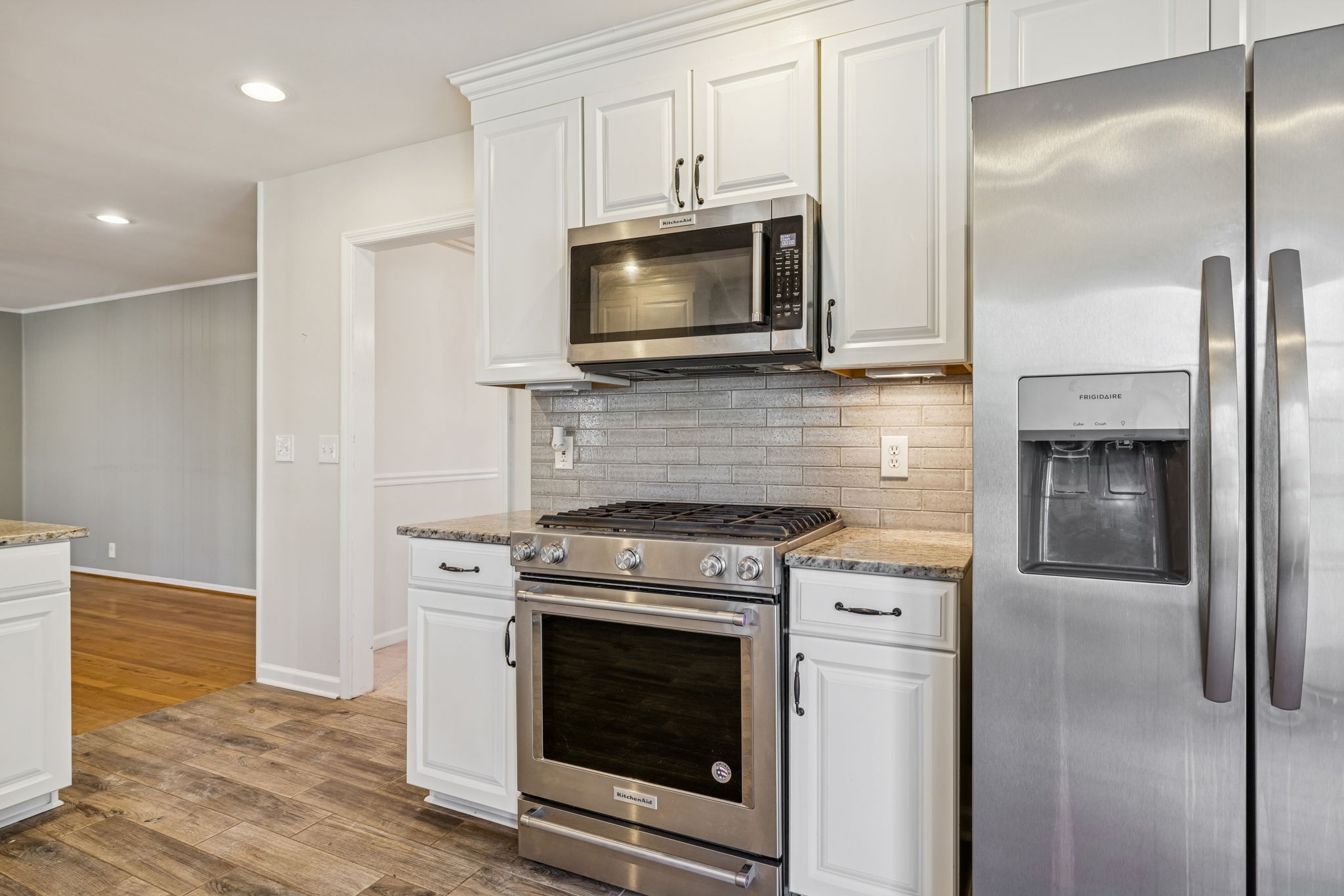 2234 Isaac Lane Franklin, TN 37064 - Photo 29 of 92 a kitchen with a stove and a microwave