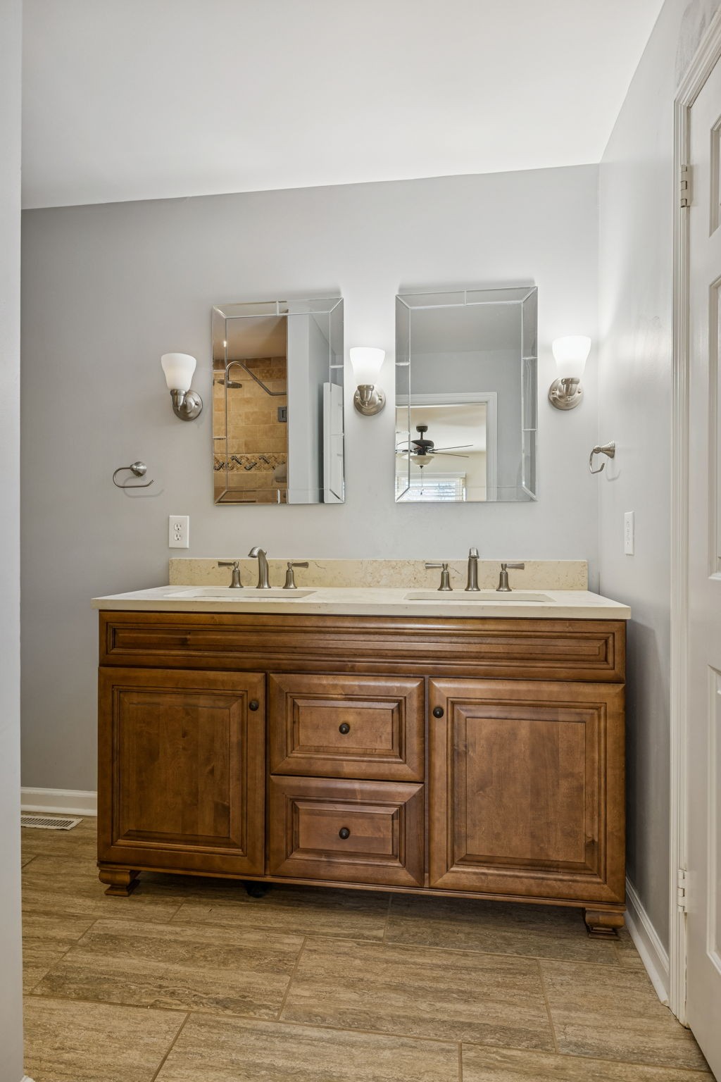 2234 Isaac Lane Franklin, TN 37064 - Photo 45 of 92 a spacious bathroom with a double vanity sink and a mirror