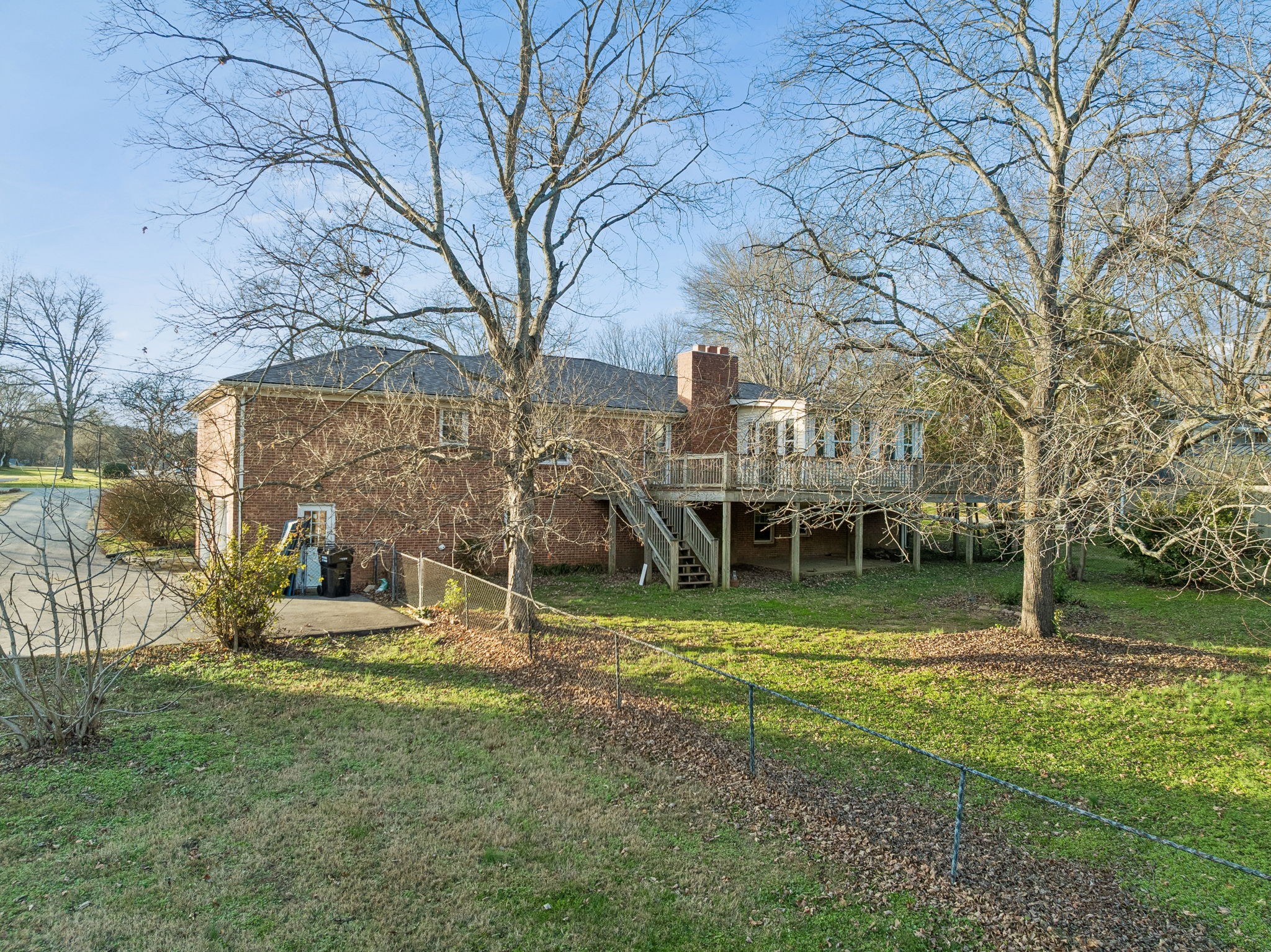 2234 Isaac Lane Franklin, TN 37064 - Photo 68 of 92 a front view of a house with a yard table and chairs