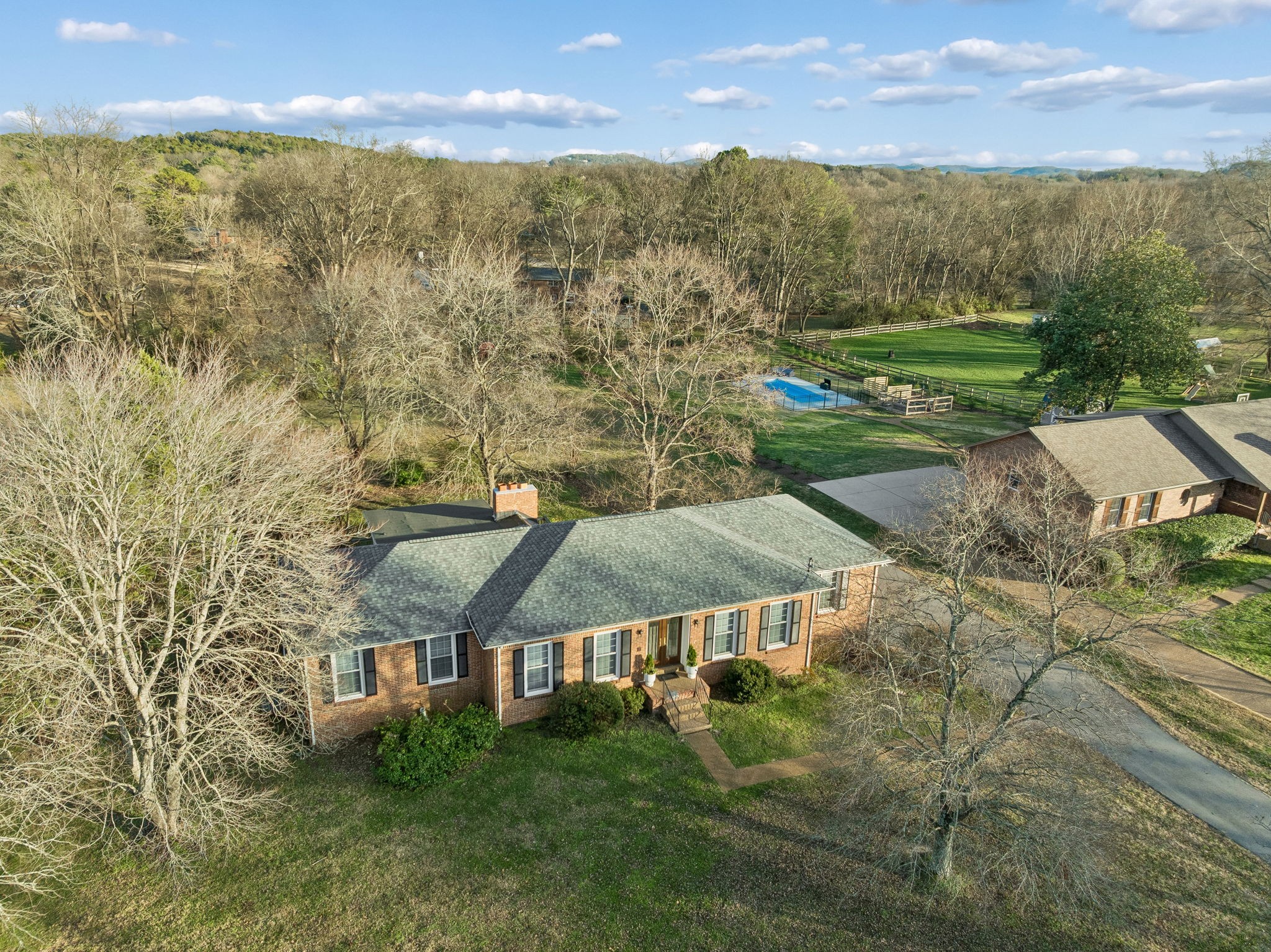 2234 Isaac Lane Franklin, TN 37064 - Photo 76 of 92 an aerial view of residential houses with outdoor space and trees