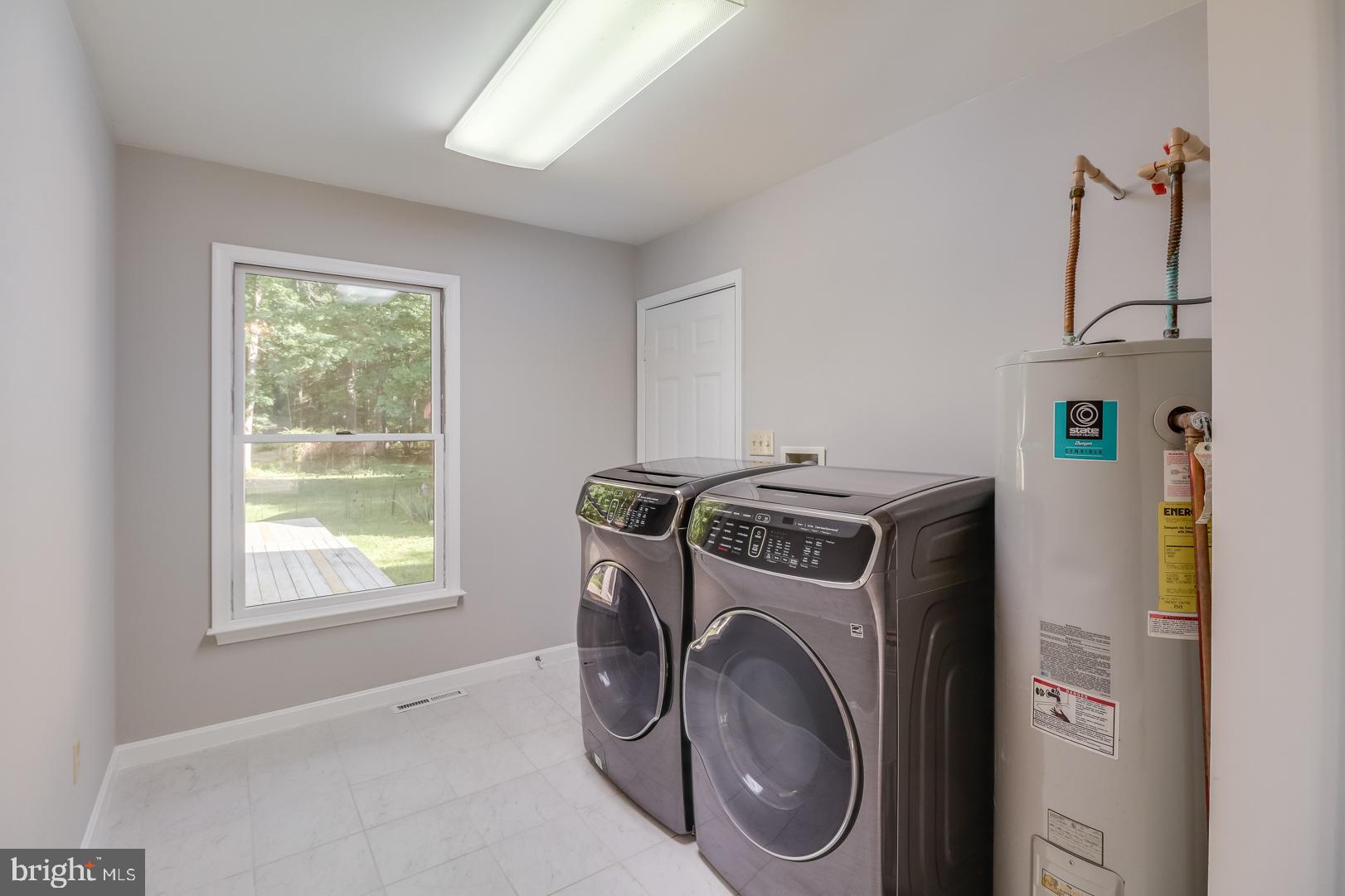 767 Judith Road Hartly, DE 19953 - Photo 22 of 34 Large mud/laundry room w/ tile floor