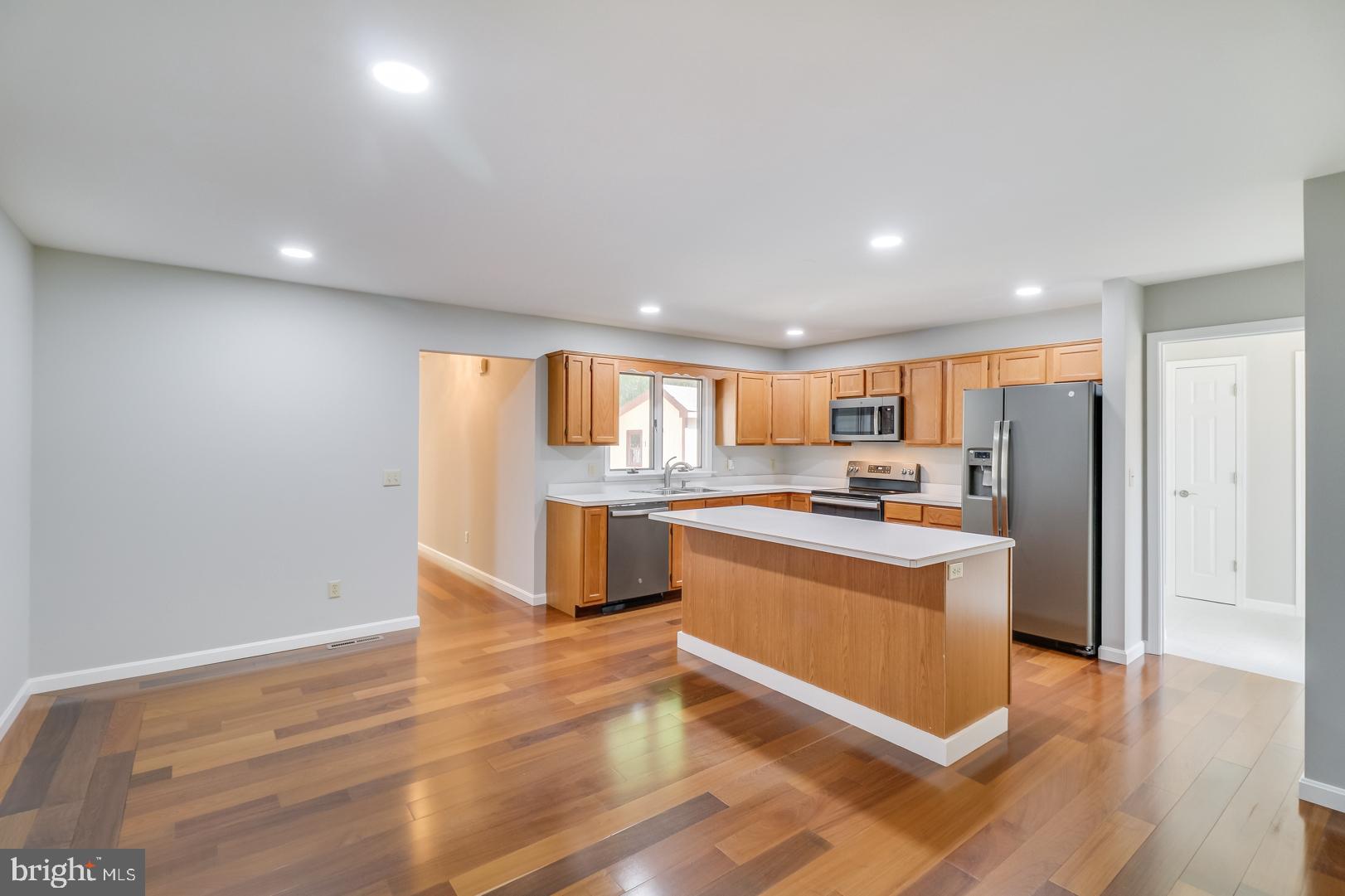 767 Judith Road Hartly, DE 19953 - Photo 10 of 34 Kitchen island overlooking the dining area