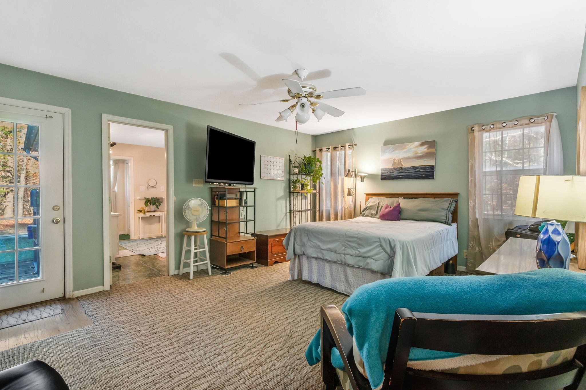 7164 Dice Lampley Road Fairview, TN 37062 - Photo 19 of 42 a bedroom with two beds and a flat screen tv