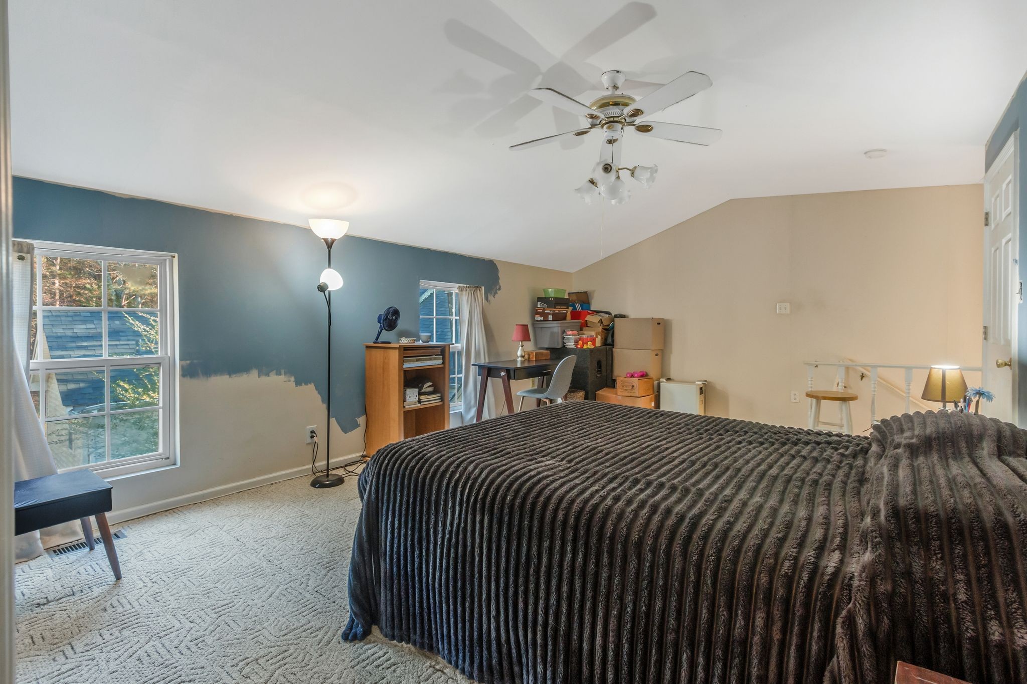 7164 Dice Lampley Road Fairview, TN 37062 - Photo 36 of 42 a bed room with a bed and a chandelier