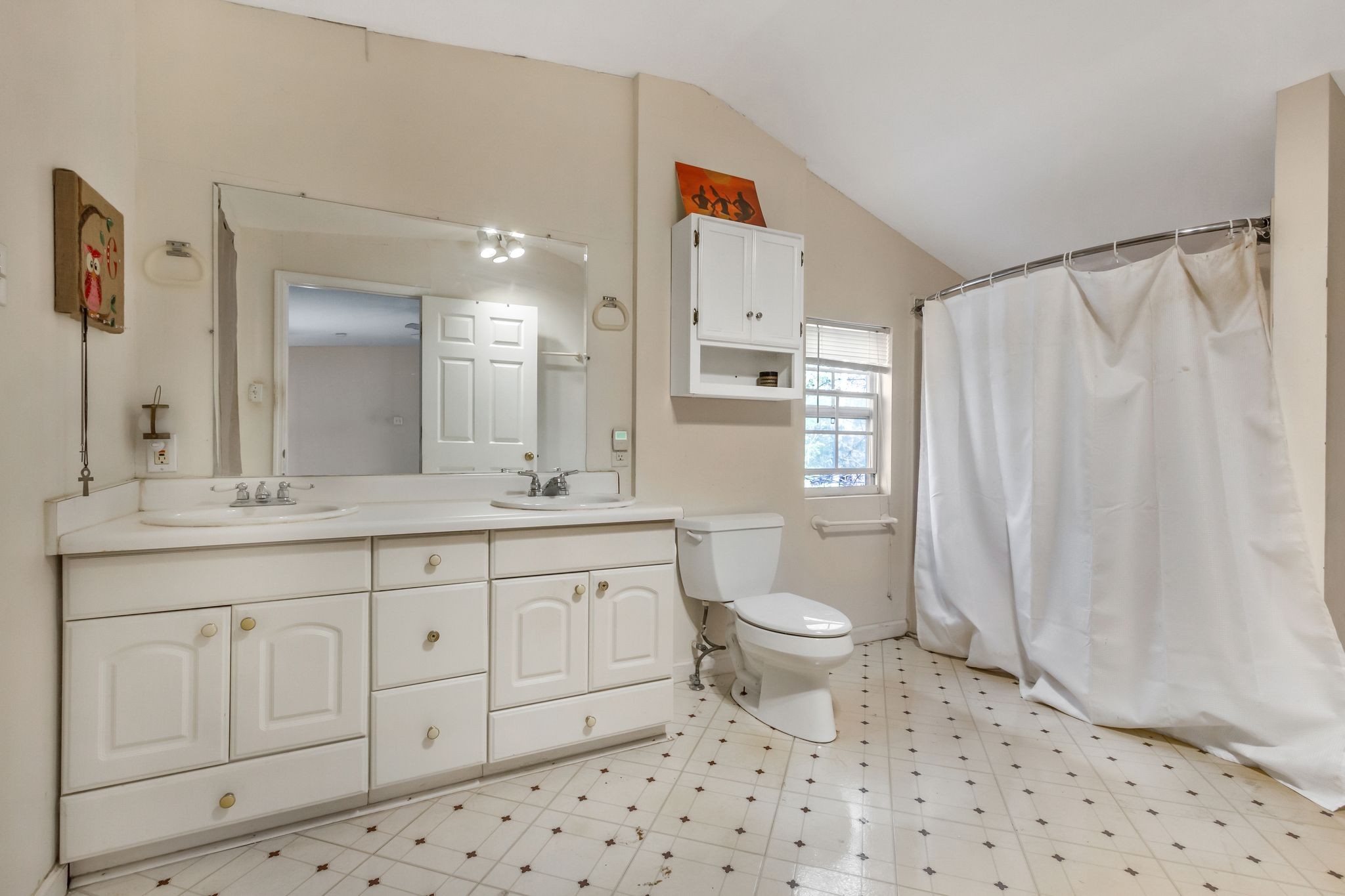 7164 Dice Lampley Road Fairview, TN 37062 - Photo 37 of 42 a bathroom with a sink a toilet and a shower