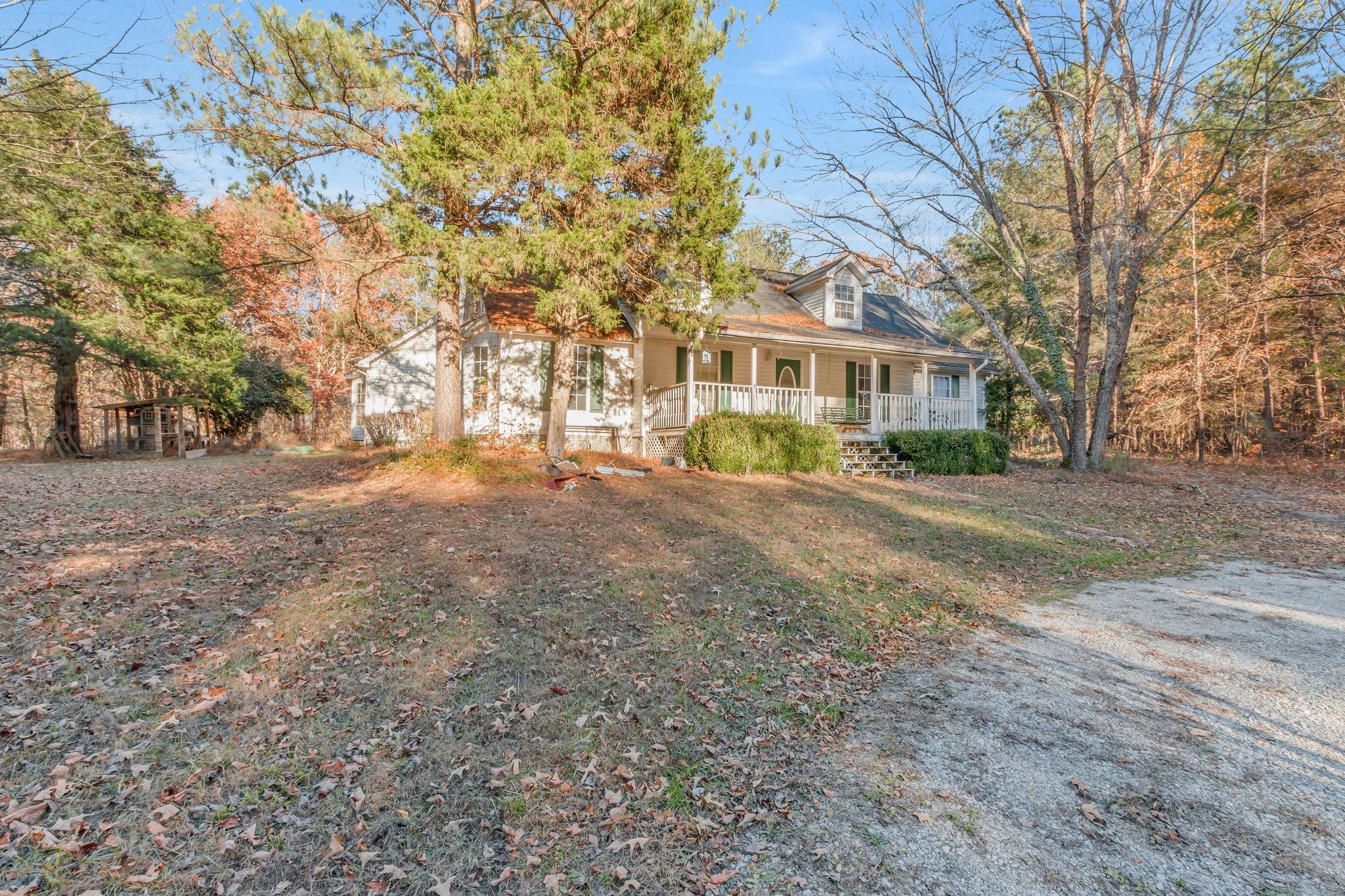 7164 Dice Lampley Road Fairview, TN 37062 - Photo 5 of 42 a front view of residential houses with yard and trees