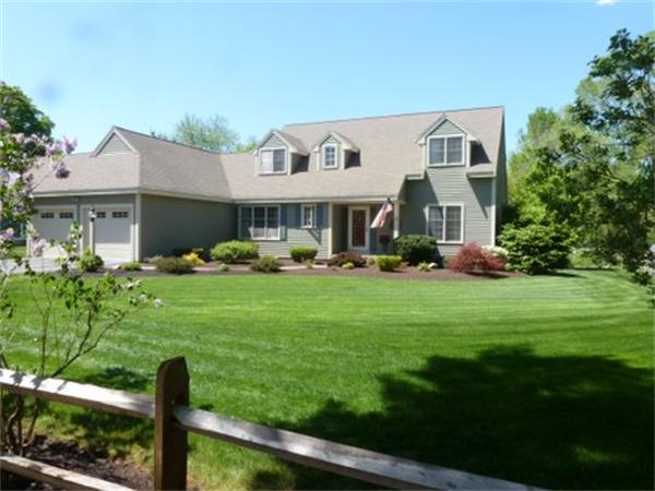 293 Concord Road Bedford, MA 01730 - Photo 1 of 20 a front view of a house with garden