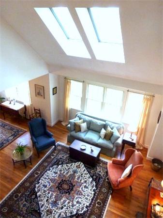 293 Concord Road Bedford, MA 01730 - Photo 11 of 20 a living room with furniture and a rug