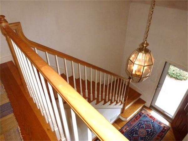 293 Concord Road Bedford, MA 01730 - Photo 13 of 20 a view of entryway with wooden floor