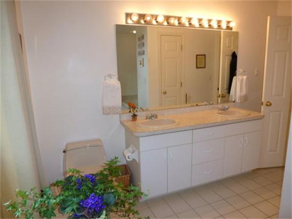 293 Concord Road Bedford, MA 01730 - Photo 15 of 20 a bathroom with a sink and a mirror