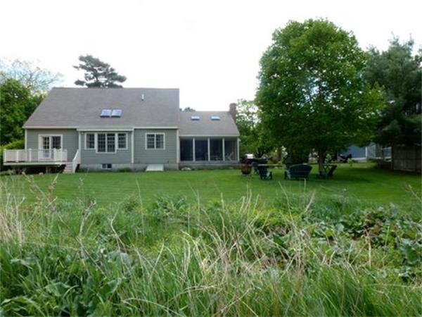 293 Concord Road Bedford, MA 01730 - Photo 2 of 20 a front view of a house with a yard