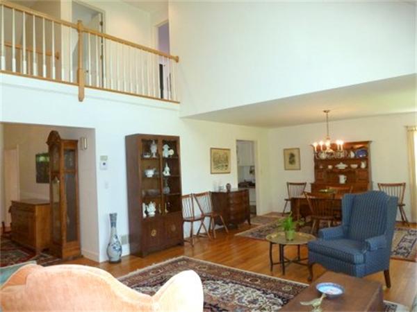 293 Concord Road Bedford, MA 01730 - Photo 9 of 20 a living room with furniture and a wooden floor