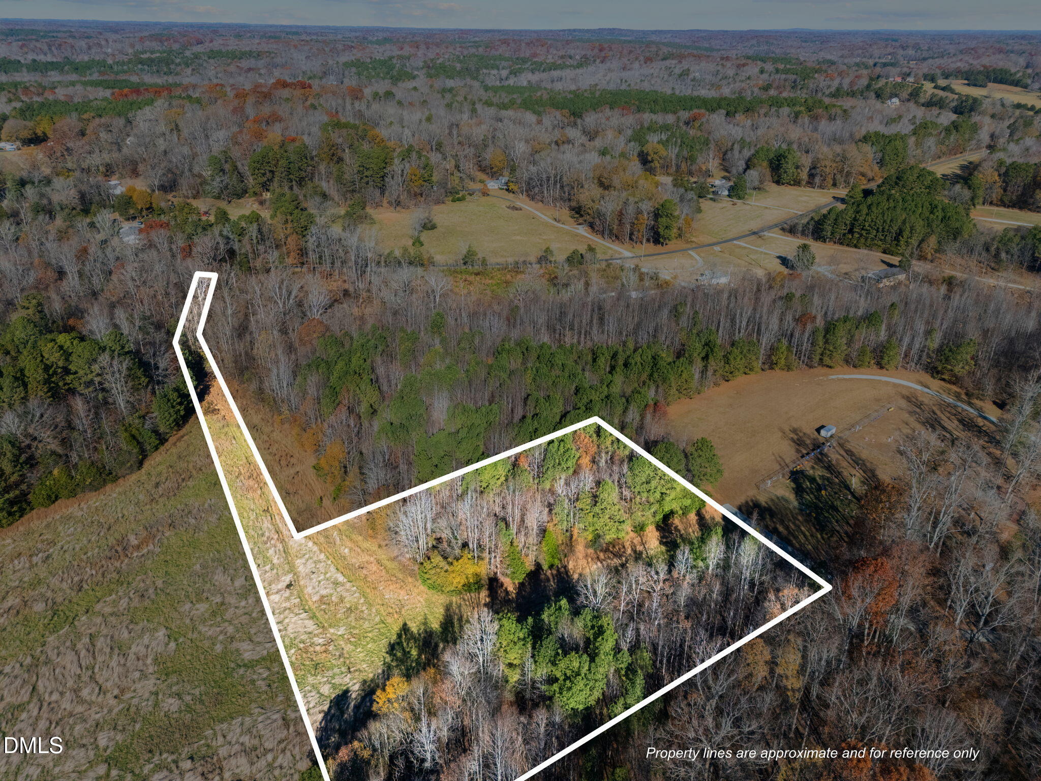 7884 South Lowell Road Bahama, NC 27503 - Photo 1 of 12 a view of a tennis court