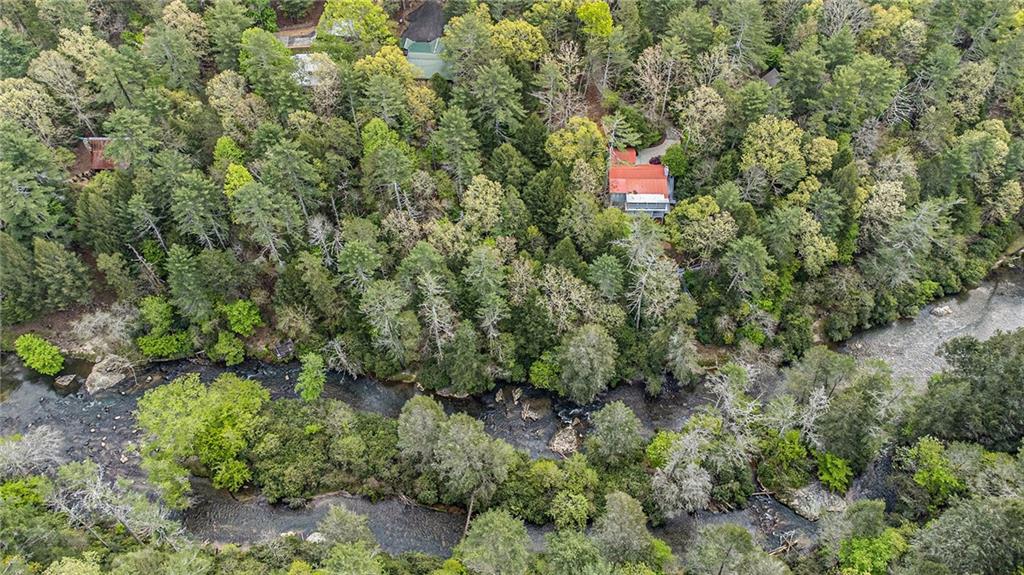 Lot 48 Indian Cave Road Ellijay, GA 30536 - Photo 7 of 10 an aerial view of a house with a yard and garden