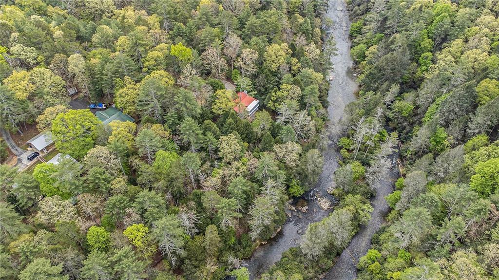 Lot 48 Indian Cave Road Ellijay, GA 30536 - Photo 8 of 10 an aerial view of residential house with outdoor space and trees