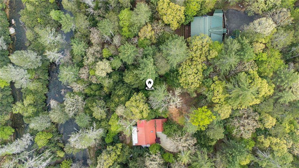 Lot 48 Indian Cave Road Ellijay, GA 30536 - Photo 10 of 10 an aerial view of a house with a yard and large tree