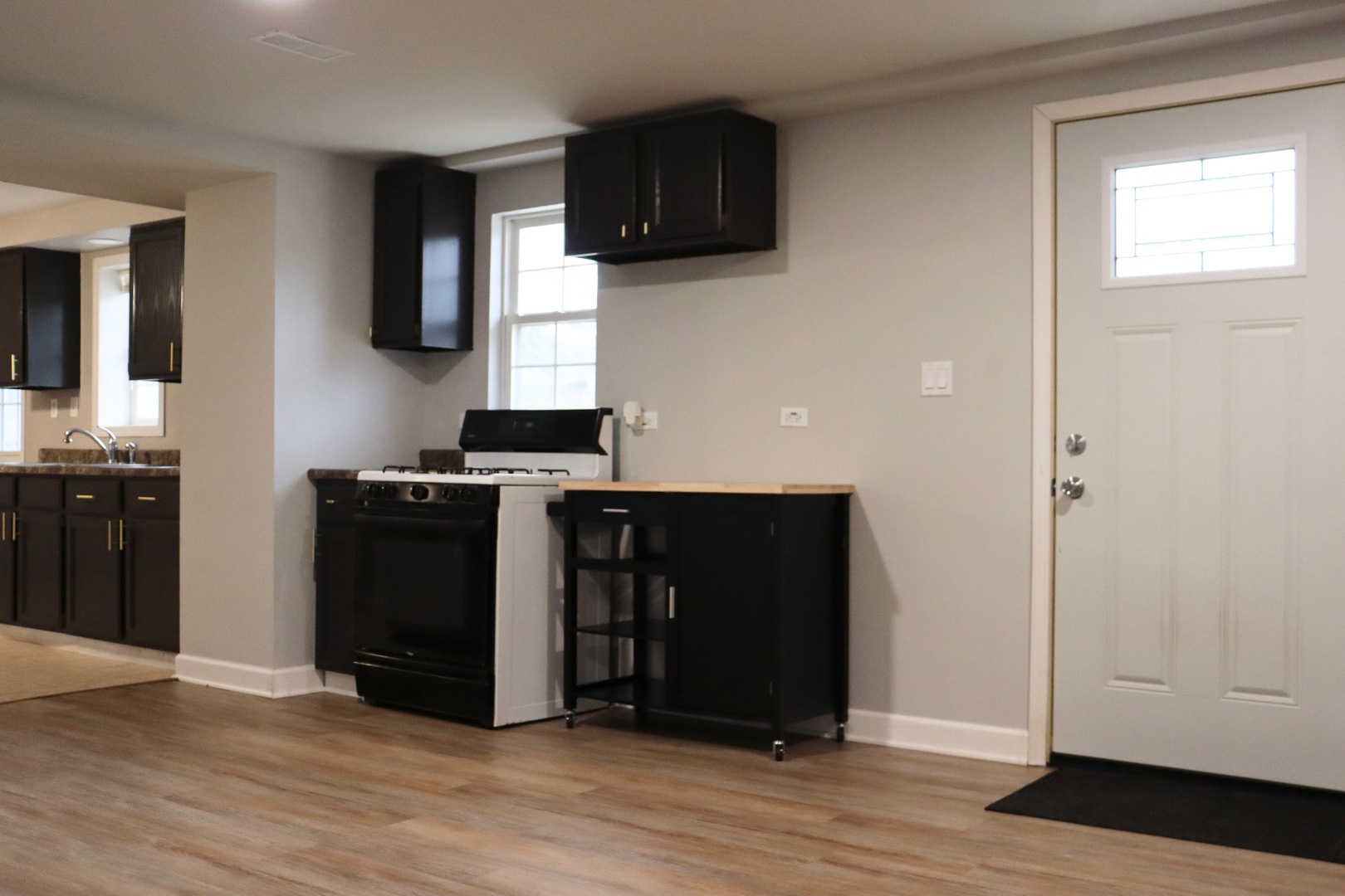 5N769 Pearson Drive, Unit 2 Wayne, IL 60184 - Photo 2 of 15 a kitchen with stainless steel appliances granite countertop a refrigerator and a stove top oven