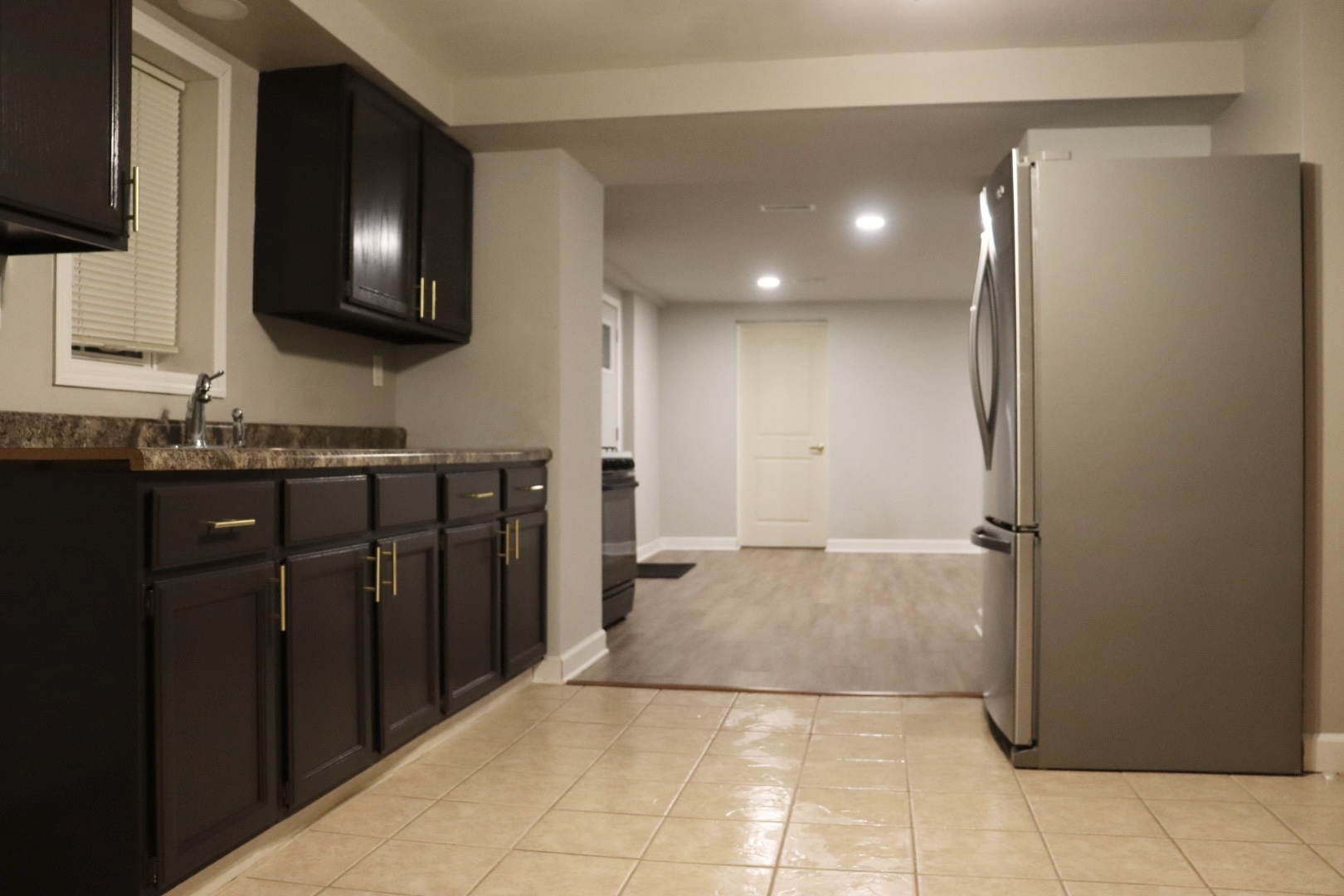 5N769 Pearson Drive, Unit 2 Wayne, IL 60184 - Photo 4 of 15 a bathroom with a sink a toilet and mirror