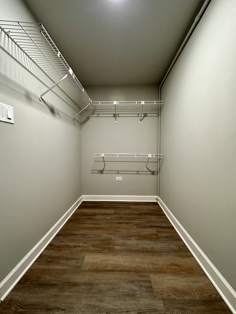 5N769 Pearson Drive, Unit 2 Wayne, IL 60184 - Photo 10 of 15 a view of a room with wooden floor