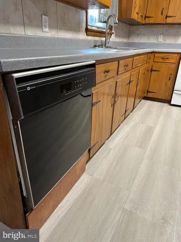 a close view of sink and microwave