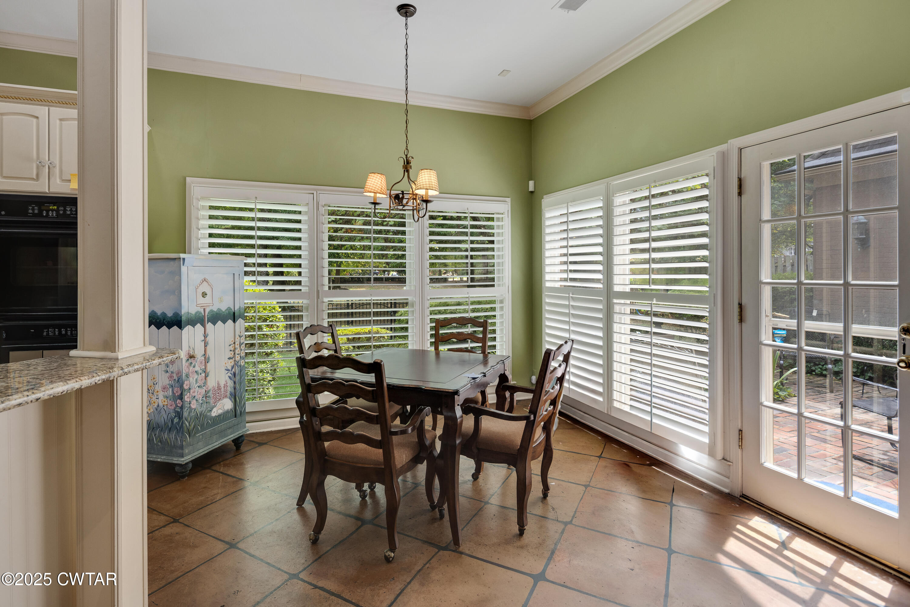 1647 Forsythe Trail Collierville, TN 38017 - Photo 11 of 32 a view of a dining room with furniture window and outside view