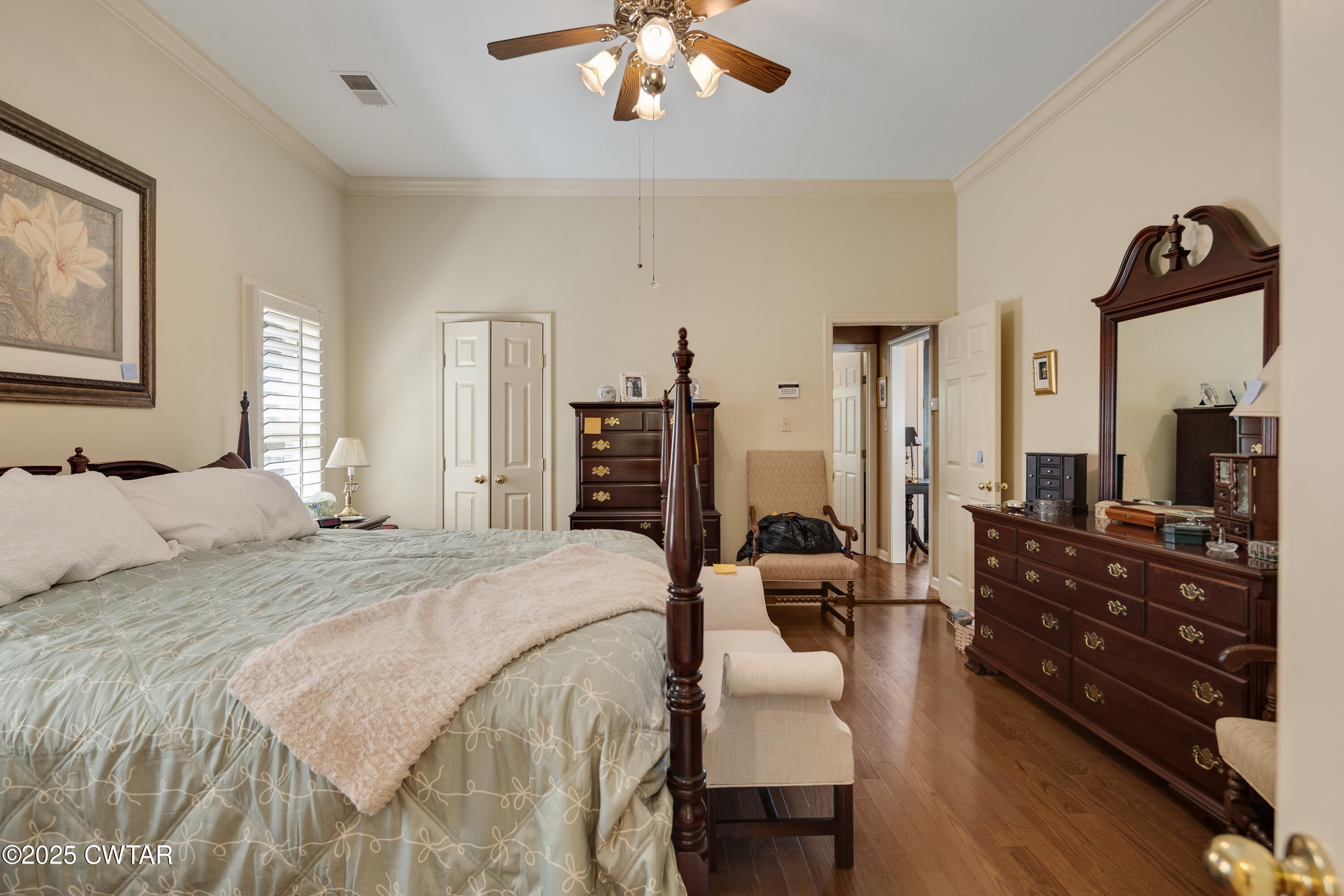 1647 Forsythe Trail Collierville, TN 38017 - Photo 18 of 32 a bedroom with a bed a couch and dresser