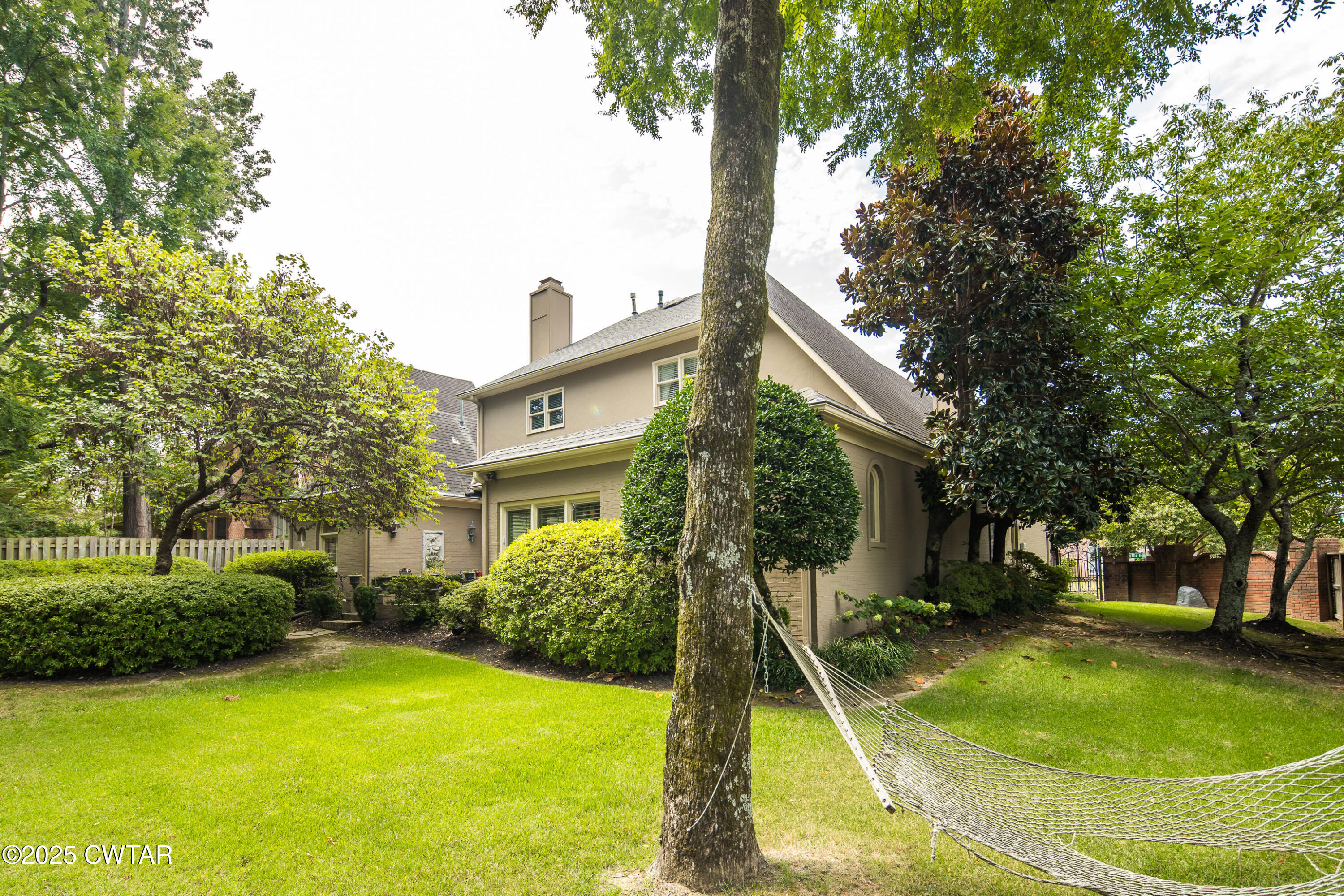 1647 Forsythe Trail Collierville, TN 38017 - Photo 26 of 32 a swimming pool with some trees and plants