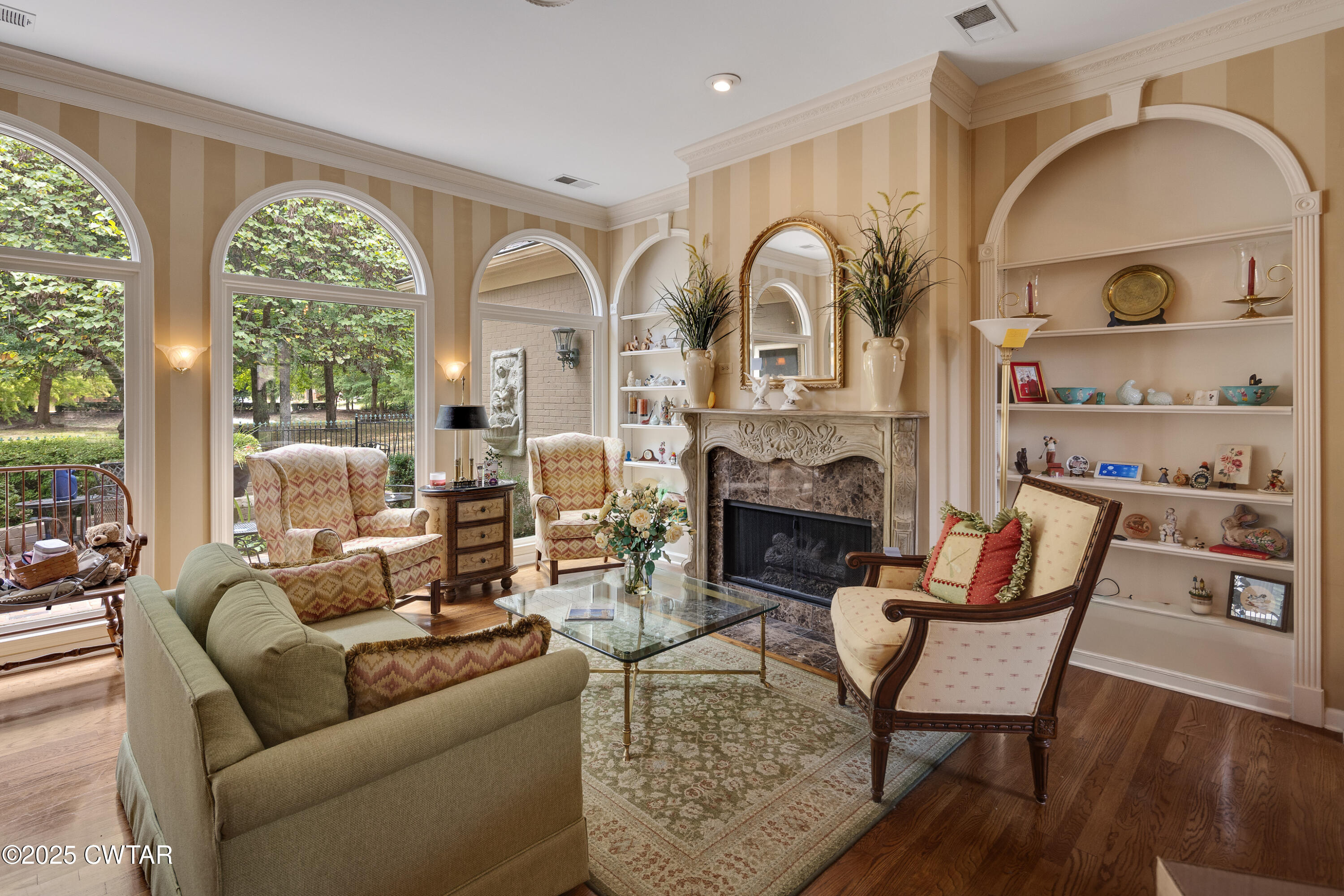 1647 Forsythe Trail Collierville, TN 38017 - Photo 7 of 32 a living room with furniture fireplace and a large window