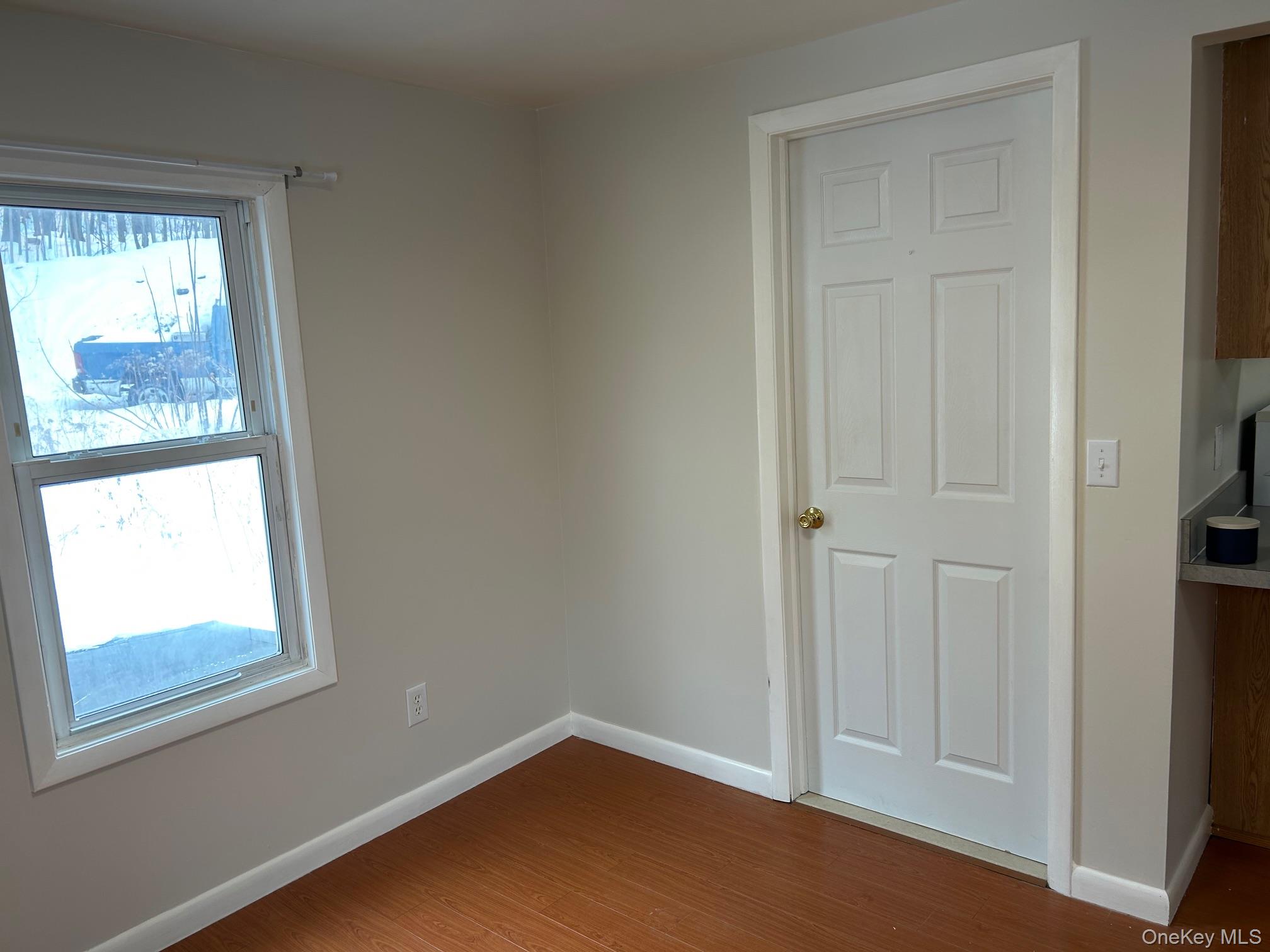 55 Pancake Hollow Road, Unit 3 Highland, NY 12528 - Photo 8 of 11 LR/Bathroom Door