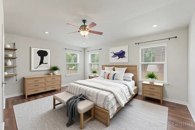 a bedroom with a bed and a dresser