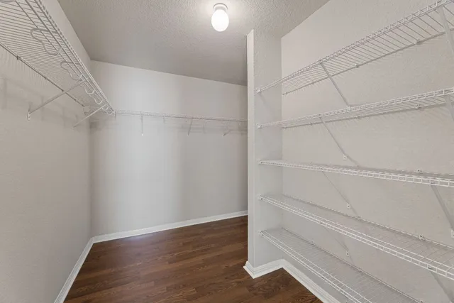 a view of an empty walk in closet