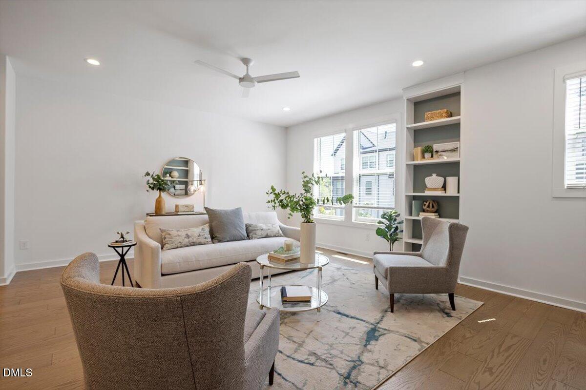 6419 Tanner Oak Lane Raleigh, NC 27613 - Photo 2 of 39 a living room with furniture and wooden floor