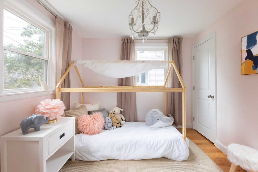 15 Wheaton Road Arlington, MA 02474 - Photo 12 of 19 a bedroom with a bed and window